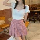 Short-sleeve Frill Trim Top / Plaid Pleated Mini A-line Skirt