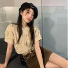 Short-sleeve Flower Applique Knit Top Almond - One Size