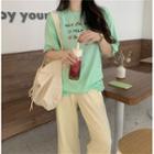 Lettering Short-sleeve T-shirt / Contrast Stripe Shorts / Straight-cut Pants