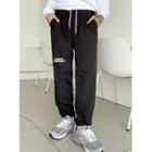 Letter-printed Cord-hem Jogger Pants
