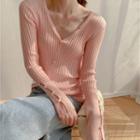 Buttoned-up Knit Top