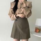 Set: Long-sleeve Contrast Trim Wide Collar Buttoned Top + Asymmetric A-line Mini Skirt