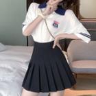 Embroidered Collared Elbow-sleeve Knit Top / Mini Pleated Skirt