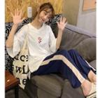 Elbow-sleeve T-shirt / Wide-leg Sweatpants