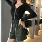 Front Zip Long-sleeve T-shirt / Faux-leather Shorts