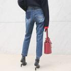 Cutout-hem Washed Tapered Jeans