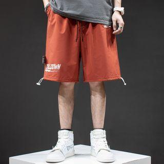 Lettering Drawstring-cuff Wide-leg Shorts