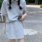 Set: Elbow-sleeve Polo Shirt + A-line Skirt