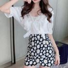 Elbow-sleeve Sleeve Ruffle Blouse / Floral Print Mini A-line Skirt