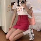 Plain Mini Skirt / Short-sleeve Print T-shirt / Tied Crop Top