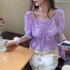 Elbow-sleeve Lace-up Peplum Top