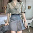 Double-breasted Short-sleeve Cropped Blouse / Pleated A-line Skirt