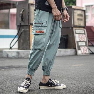 Pocketed Drawstring Cropped Pants
