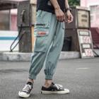 Pocketed Drawstring Cropped Pants
