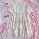 Short-sleeve Floral Print A-line Dress Beige - One Size