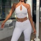 Set: Cut-out Cropped Halter Top + Plain Pants