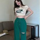 Short-sleeve Lettering Cropped T-shirt / Distressed Wide Leg Pants
