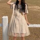 Short-sleeve Letter Mesh Overlay T-shirt Dress Almond - One Size