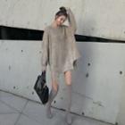 Loose-fit Asymmetric Glitter Top