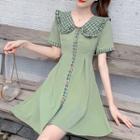 Short-sleeve Plaid Paneled Buttoned A-line Mini Dress