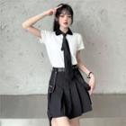Short-sleeve Polo Shirt / Neck Tie / Pleated A-line Skirt / Faux Leather Belt