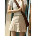 Short-sleeve Polo Neck Ribbed Knit Top / Pleated Mini Skirt