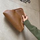 Asymmetric Triangular Clutches With Strap