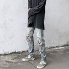 Mid Rise Checker Print Distressed Straight Leg Jeans