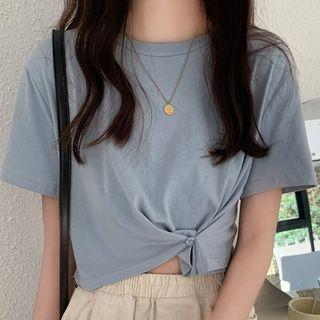 Short-sleeve Round Neck Asymmetric Hem Crop Top