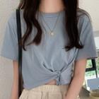 Short-sleeve Round Neck Asymmetric Hem Crop Top