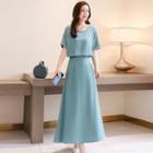 Set: Tie-neck Short-sleeve Blouse + Maxi A-line Skirt