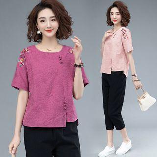 Short-sleeve Embroidered Asymmetrical Hem Blouse