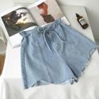 Asymmetric Fringed High-waist Lace-up Denim Shorts