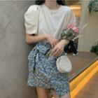 Puff-sleeve Plain T-shirt / Asymmetric Ribbon Floral Mini Skirt