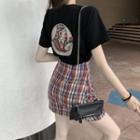 Set: Short-sleeve Printed Back T-shirt + Plaid Mini A-line Skirt