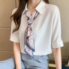 Short-sleeve Floral Print Tie-neck Shirt