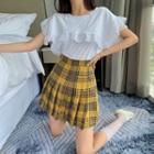 Peter Pan Collar Cutout Top / Plaid Pleated Skirt