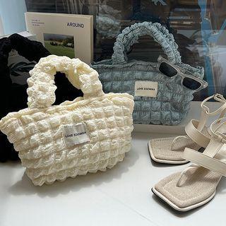 Tag-patched Quilted Tote Bag