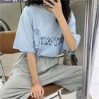Elbow-sleeve Lettering Print T-shirt / Harem Sweatpants