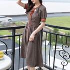 Short Sleeve Tie-neck Dotted A-line Dress