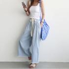 Drawstring-waist Fringe-hem Wide-leg Pants