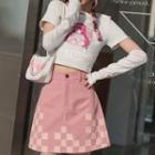 Short-sleeve Cartoon Print T-shirt / Arm Sleeves / Checkered Mini A-line Skirt