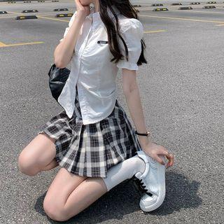 Short-sleeve Logo Shirt + Plaid Pleated Mini Skirt
