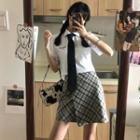 Short-sleeve Letter Embroidered Polo Shirt / Tie / Plaid Irregular Mini Skirt / Set