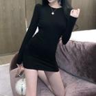 Long-sleeve Open-back Lace Panel Sheath Dress