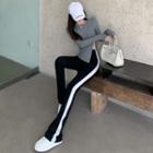 Long-sleeve Side-slit T-shirt / Striped Boot-cut Pants
