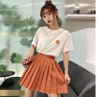 Plaid Pleated Skirt / Printed Short-sleeve T-shirt