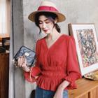 3/4-sleeve Dotted Peplum Blouse