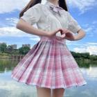 Short-sleeve Ruffle Trim Plain Blouse / High-waist Plaid Pleated Skirt