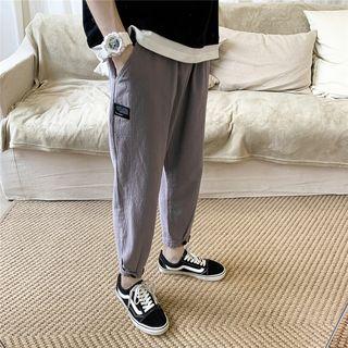 Label Appliqued Tapered Pants